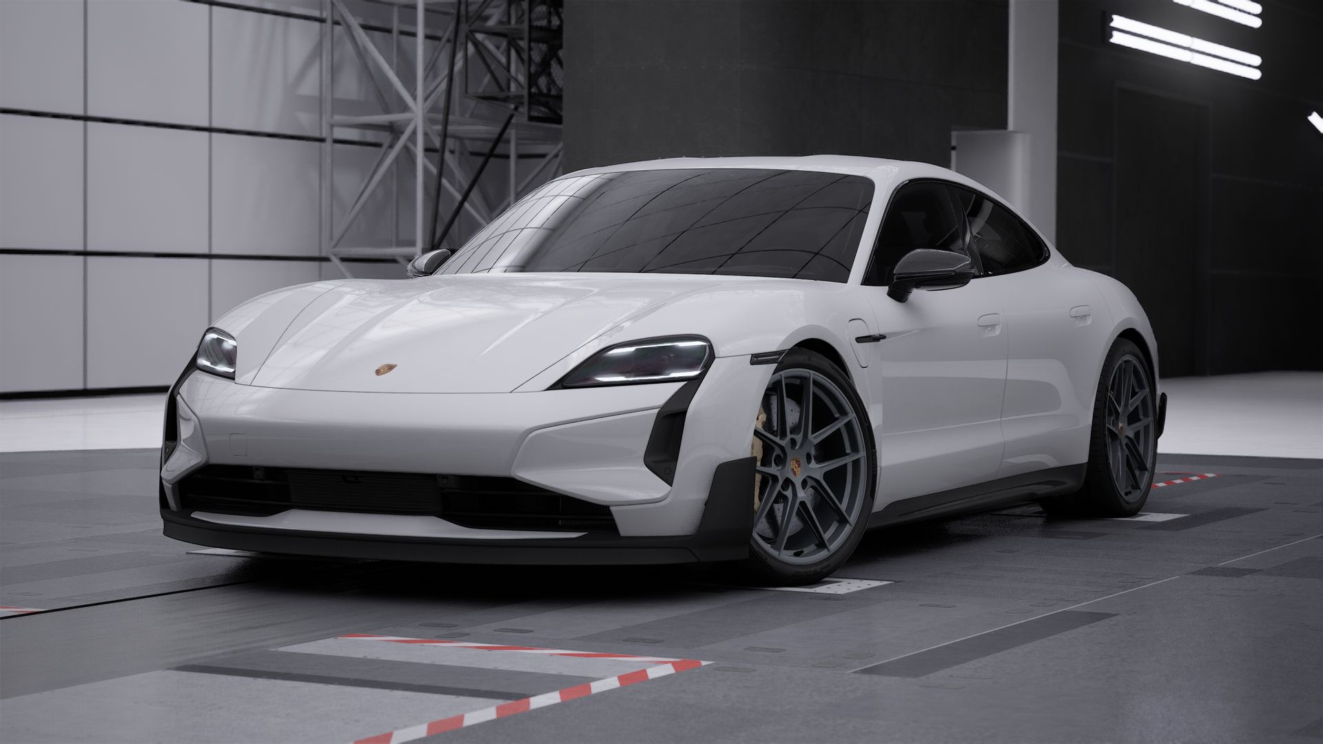 Außenansicht von Taycan Turbo GT mit der Vorderseite und der linken Seite des Fahrzeugs