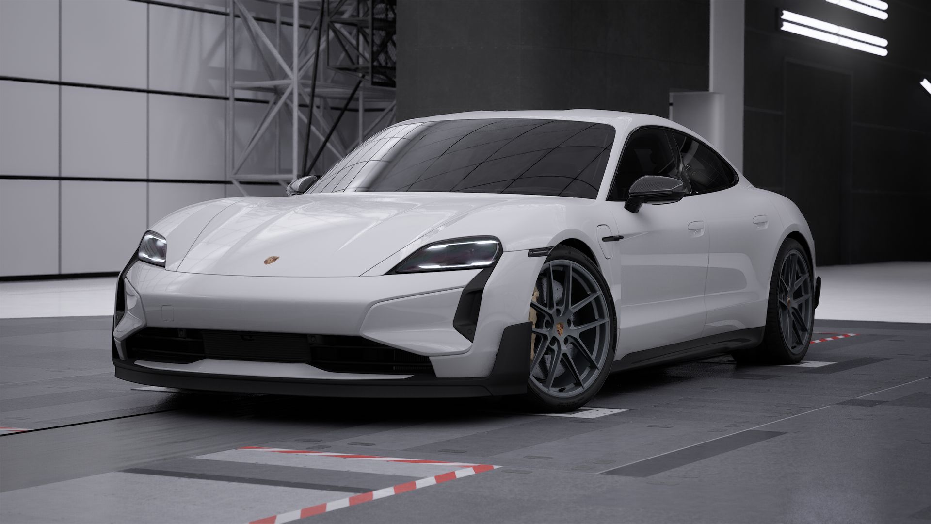 Außenansicht von Taycan Turbo GT mit der Vorderseite und der linken Seite des Fahrzeugs