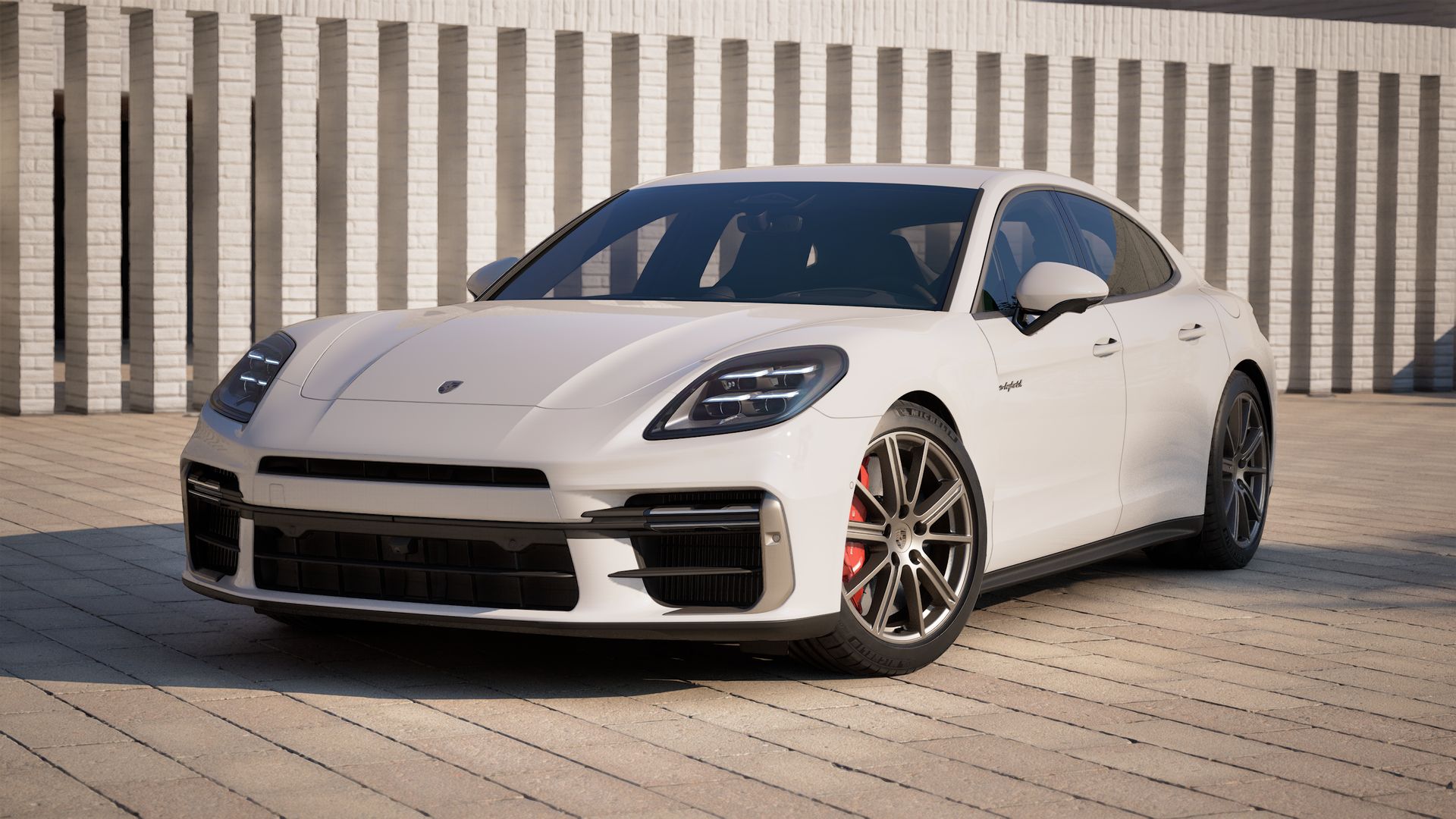 Vnější pohled na Panamera Turbo E-Hybrid zobrazující přední a levou stranu vozu