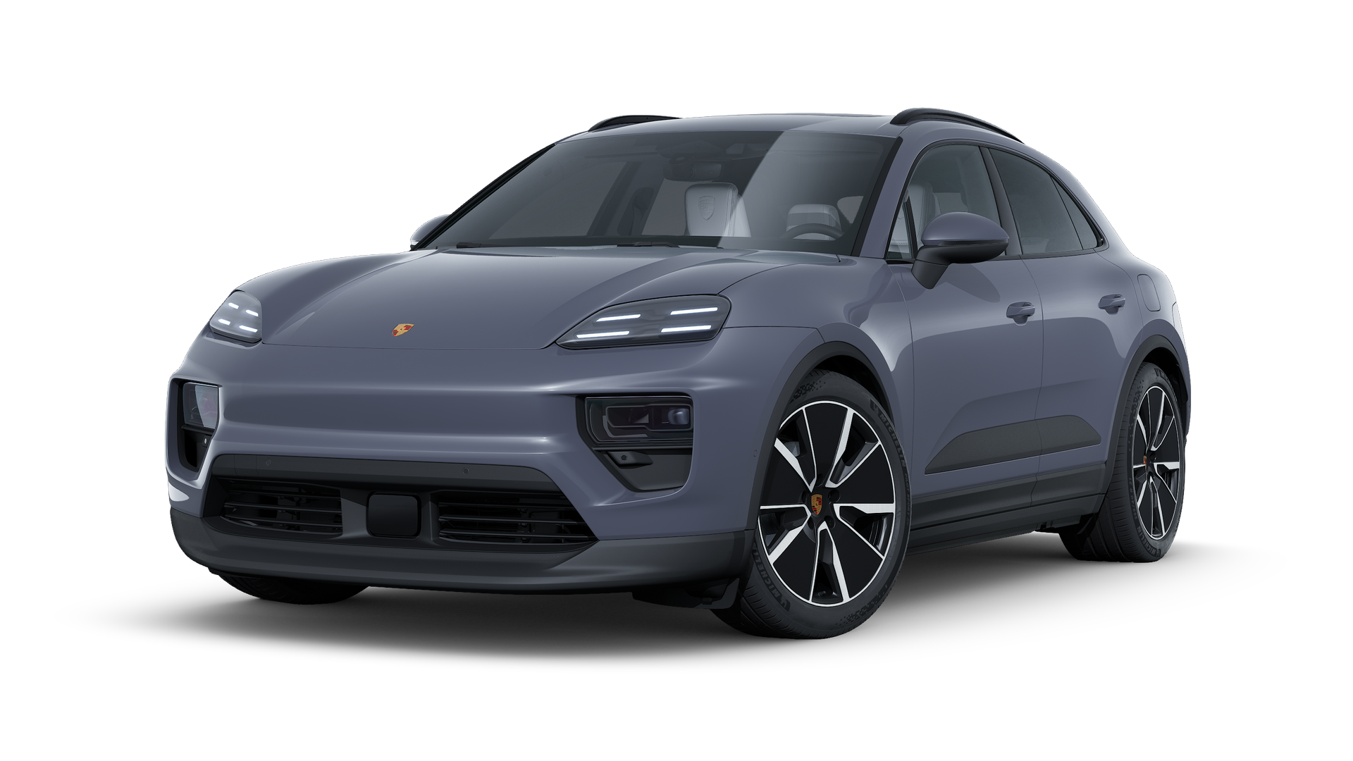 Exterior view of Macan Electric showing the front and left side of the car