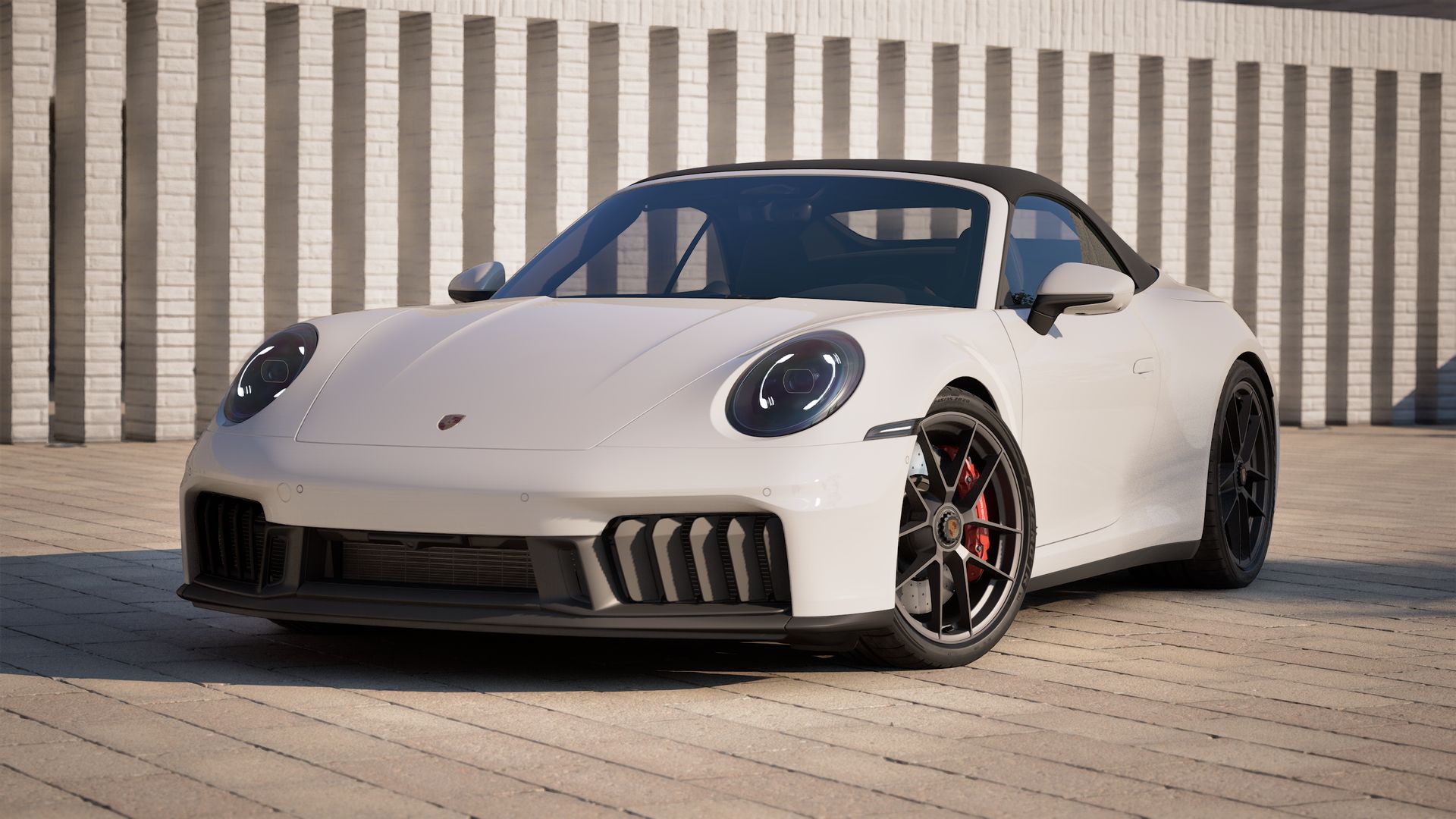 Exterior view of 911 Carrera 4 GTS Cabriolet showing the front and left side of the car