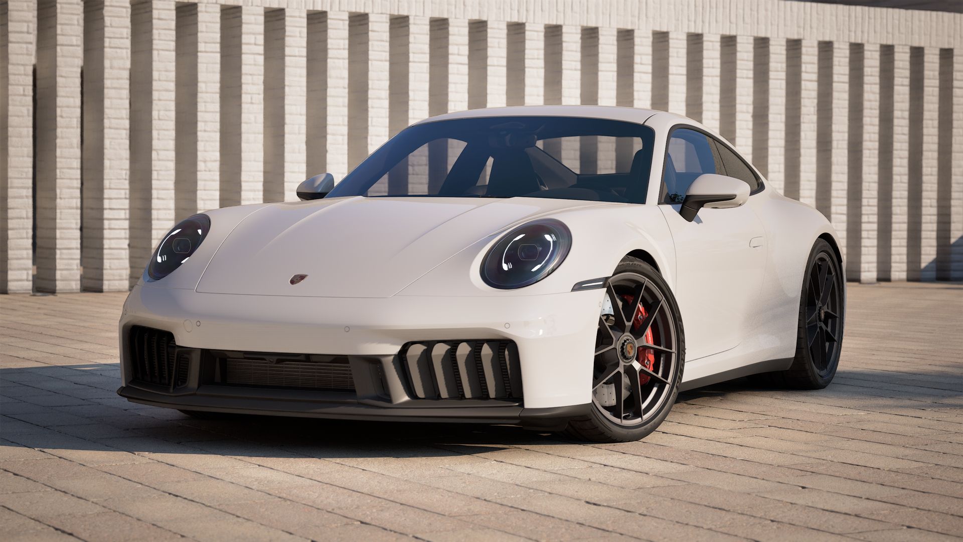 Vista exterior de 911 Carrera GTS mostrando la parte delantera y el lado izquierdo del coche