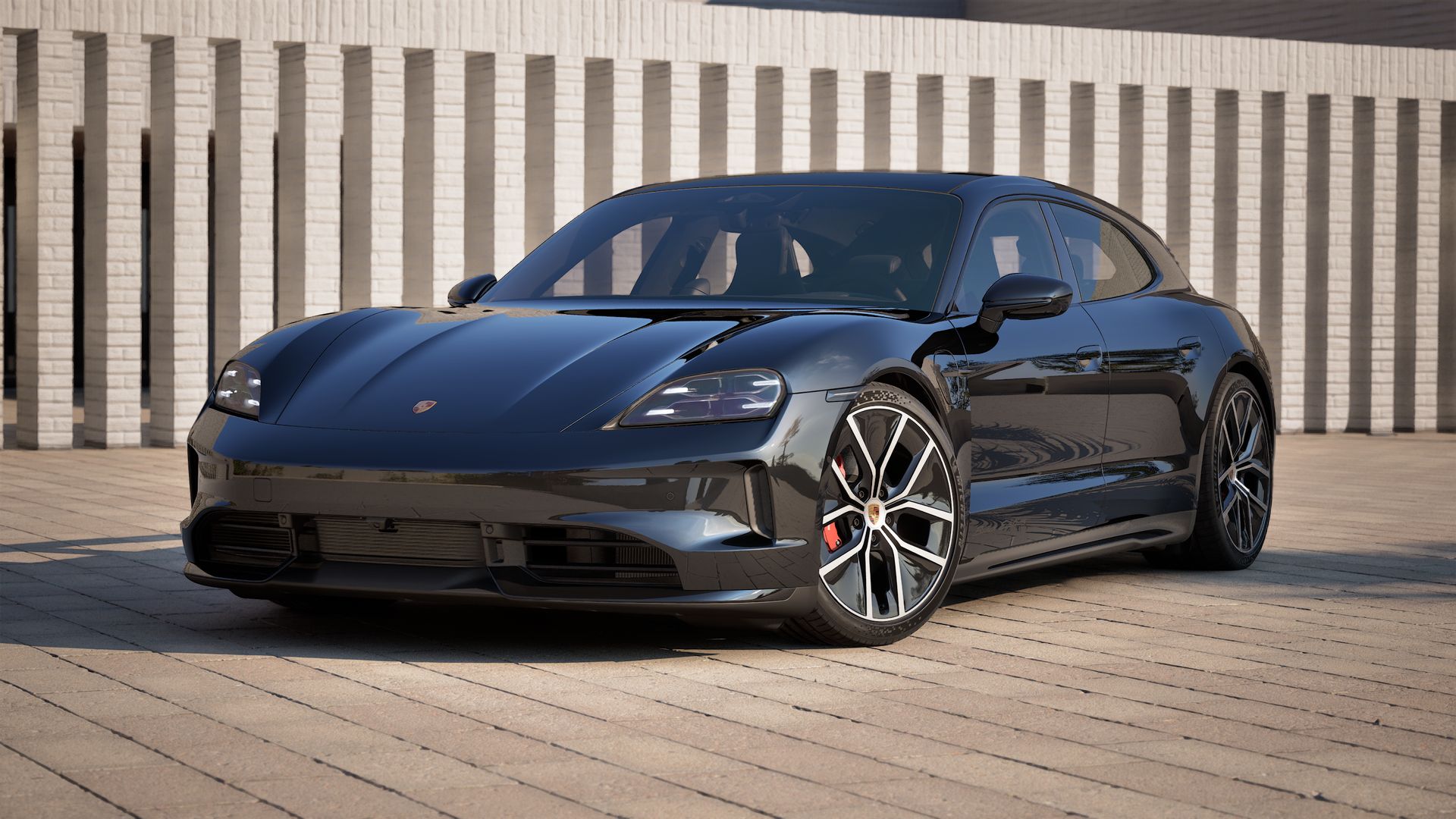 Taycan 4S Sport Turismo Black Edition adresinin aracın ön ve sol tarafını gösteren dış görünümü