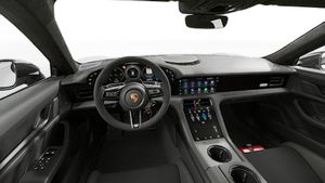 Vista interior que muestra el volante y el tablero de Taycan Turbo GT with Weissach Package
