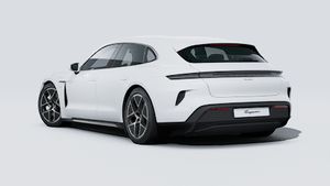 Außenansicht von Taycan Turbo Sport Turismo mit der Rückseite und der linken Seite des Fahrzeugs