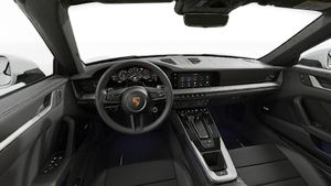Interior view showing the steering wheel and dashboard of 911 Carrera Cabriolet