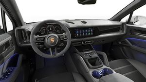 Interior view showing the steering wheel and dashboard of Cayenne GTS