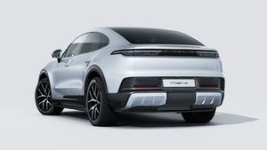 Exterior view of Cayenne S Coupé Electric showing the back and left side of the car