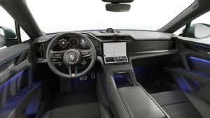Interior view showing the steering wheel and dashboard of Cayenne Turbo Coupé Electric