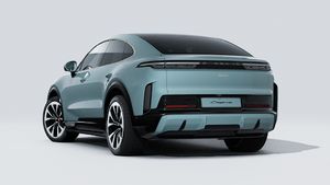 Exterior view of Cayenne Turbo Coupé Electric showing the back and left side of the car
