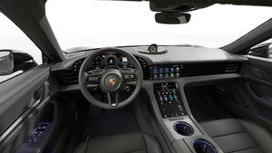 Interior view showing the steering wheel and dashboard of Taycan 4 Black Edition