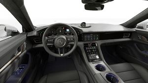 Interior view showing the steering wheel and dashboard of Taycan Turbo Cross Turismo