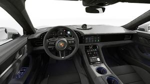 Taycan GTS Sport Turismo avtomobilinin sükanı və idarə panelini göstərən daxili görünüş
