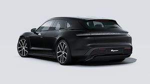 Spoljašnji pogled na Taycan Sport Turismo Black Edition koji prikazuje stražnju i lijevu stranu automobila