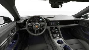 Binnenaanzicht van het stuur en het dashboard van de Taycan Black Edition