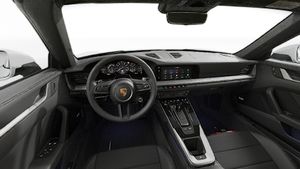 Interior view showing the steering wheel and dashboard of 911 Targa 4S