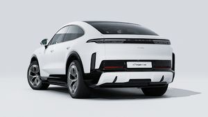 Exterior view of Cayenne Turbo Coupé Electric showing the back and left side of the car