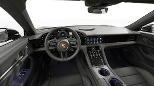 Interior view showing the steering wheel and dashboard of Taycan 4S Black Edition
