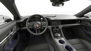 Interior view showing the steering wheel and dashboard of Taycan 4 Cross Turismo