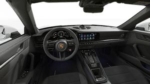 Interior view showing the steering wheel and dashboard of 911 Carrera GTS Cabriolet