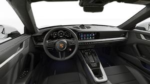 Interior view showing the steering wheel and dashboard of 911 Carrera Cabriolet