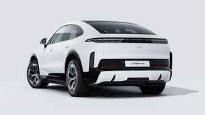 Exterior view of Cayenne Turbo Coupé Electric showing the back and left side of the car