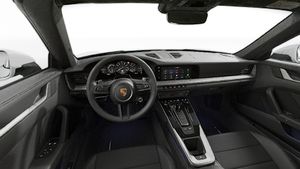 Interior view showing the steering wheel and dashboard of 911 Targa 4S