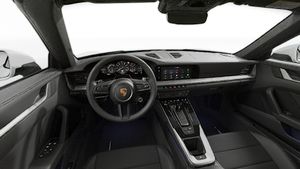 Interior view showing the steering wheel and dashboard of 911 Carrera 4S Cabriolet