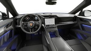 Interior view showing the steering wheel and dashboard of Cayenne S Electric