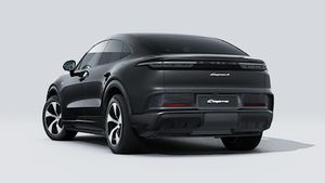 Exterior view of Cayenne S Coupé Electric showing the back and left side of the car