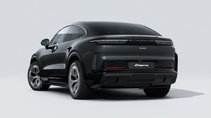 Exterior view of Cayenne Turbo Coupé Electric showing the back and left side of the car