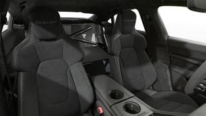 Interior view showing the front seats of Taycan Turbo GT with Weissach Package
