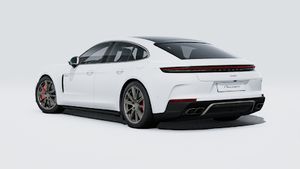 Exterior view of Panamera Turbo E-Hybrid showing the back and left side of the car