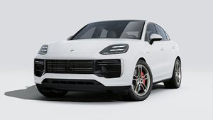 Vista esterna di Cayenne Turbo E-Hybrid Coupé che mostra la parte anteriore e il lato sinistro della vettura
