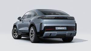 Vista esterna di Cayenne Turbo Coupé Electric che mostra il retro e il lato sinistro della vettura