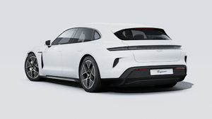 Außenansicht von Taycan Turbo Sport Turismo mit der Rückseite und der linken Seite des Fahrzeugs