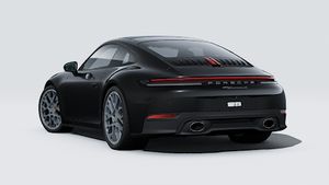 Vista exterior de 911 Carrera S mostrando la parte trasera y el lado izquierdo del coche