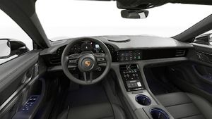 Vista interior que muestra el volante y el salpicadero de Taycan 4S Black Edition