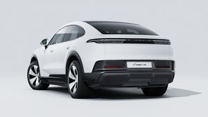 Exterior view of Cayenne Coupé Electric showing the back and left side of the car