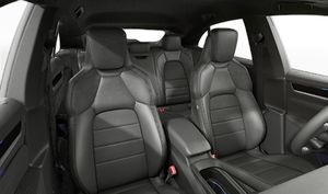 Interior view showing the front seats of Macan Electric