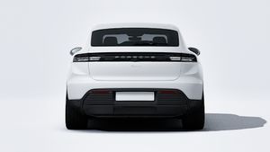 Exterior view of Macan Electric showing the rear of the car