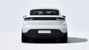 Exterior view of Macan 4 Electric showing the rear of the car