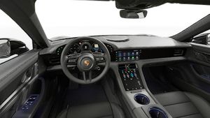 Interior view showing the steering wheel and dashboard of Taycan 4S Black Edition