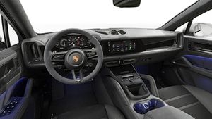 Interior view showing the steering wheel and dashboard of Cayenne GTS Coupé