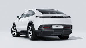 Exterior view of Cayenne Coupé Electric showing the back and left side of the car