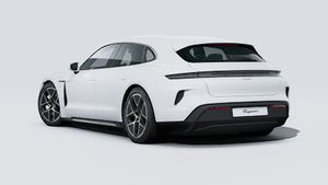 Exterior view of Taycan Turbo Sport Turismo showing the back and left side of the car