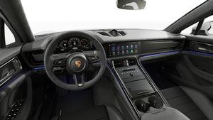 Interior view showing the steering wheel and dashboard of Panamera GTS