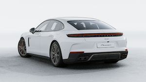 Exterior view of Panamera Turbo E-Hybrid showing the back and left side of the car