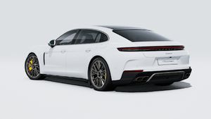 Exterior view of Panamera Turbo S E-Hybrid Executive showing the back and left side of the car