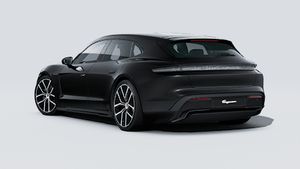 Außenansicht von Taycan Sport Turismo Black Edition mit der Rückseite und der linken Seite des Fahrzeugs
